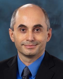 Portrait of Burak Ozpineci